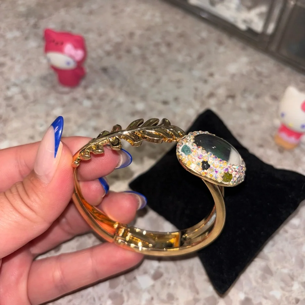 Gold Leaf Cuff Bracelet with Iridescent Gem